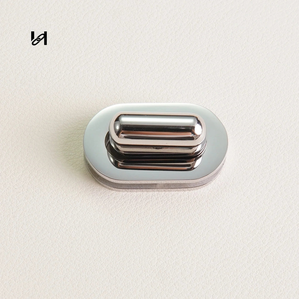 Best-Selling 33×20mm Stainless Steel Rounded Rectangle Turn Locks – Custom Hardware for Bags & Brands - hardware
