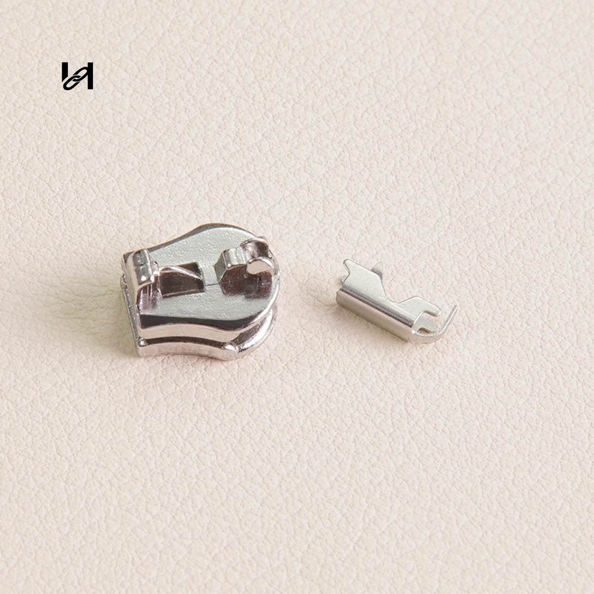 Silver zipper slider and stainless steel zipper stop